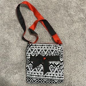 Red, black and white crossbody